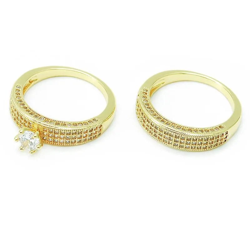 Conjunt únic d'anells de núvia xapat en or